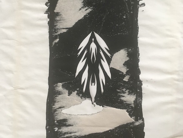 A black & white inked paper cut out for a screen print of a figure surrounded by mysterious shapes